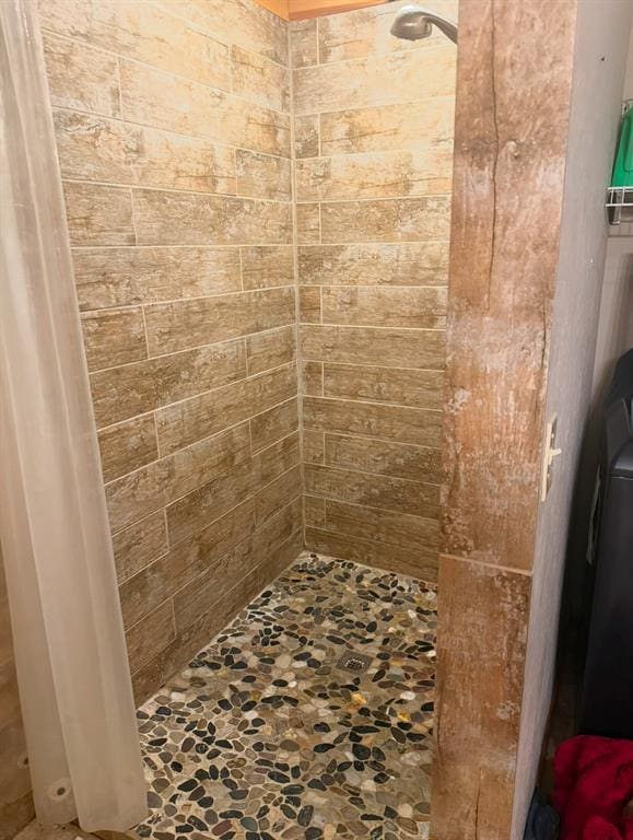728 S Carol St, Carnegie, OK 73015 - bathroom with stone floors and tiled shower