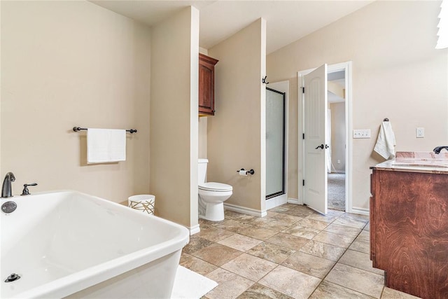 full bathroom featuring vanity, toilet, and shower with separate bathtub