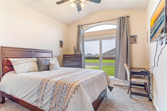 carpeted bedroom with lofted ceiling and ceiling fan