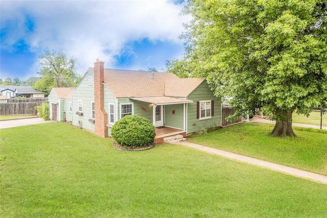 bungalow-style house with a front lawn