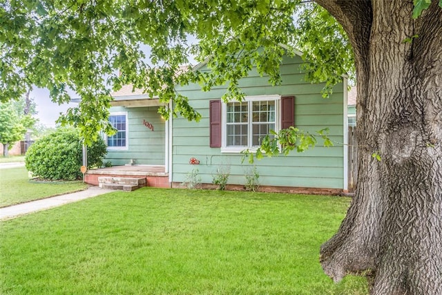 exterior space with a lawn