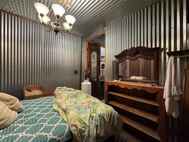 bedroom featuring an inviting chandelier