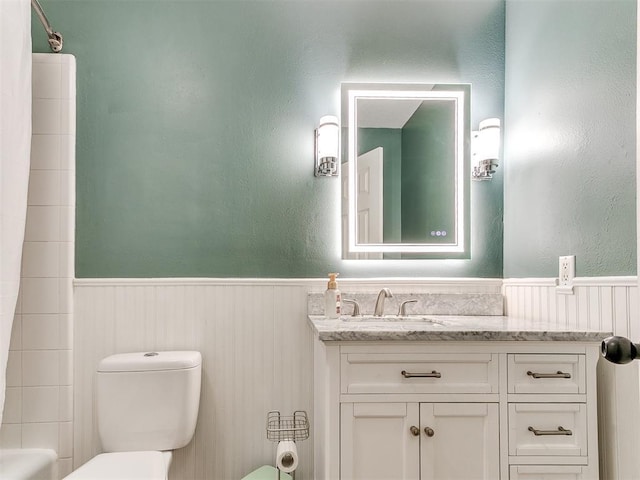 full bathroom with vanity, shower / bathing tub combination, and toilet