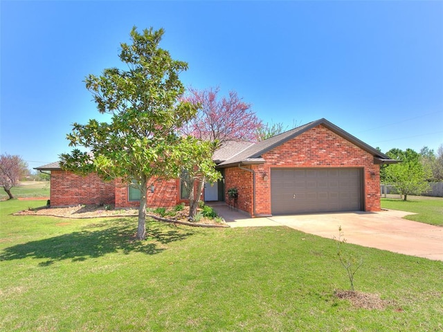 ranch-style house with a garage, a front yard, brick siding, and driveway