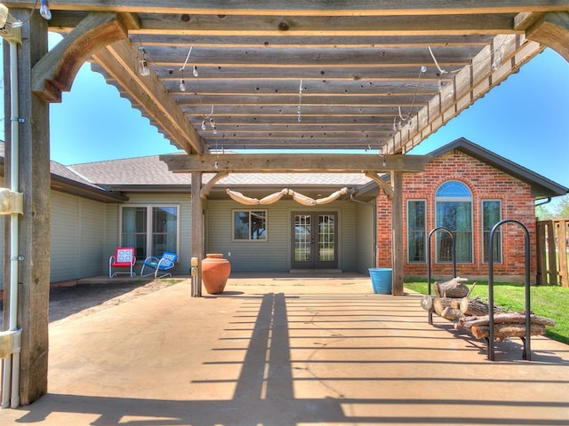 view of patio / terrace with french doors and a pergola