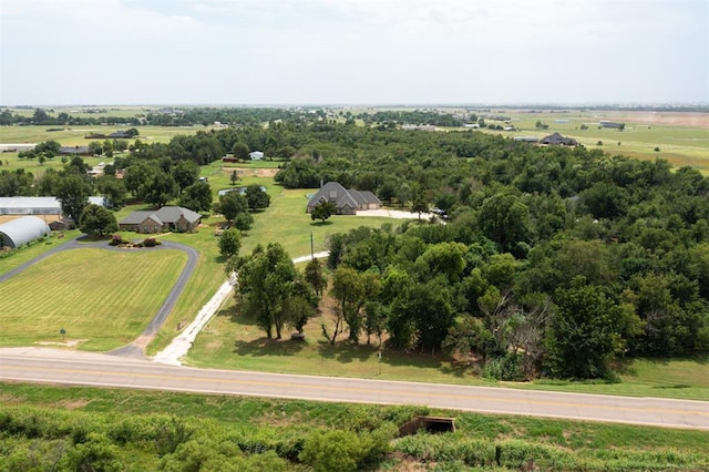 birds eye view of property featuring a rural view