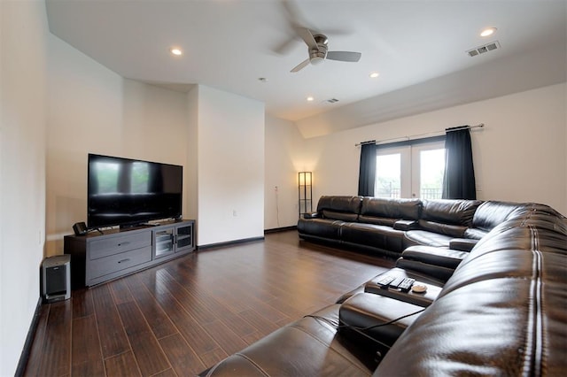 living room with dark hardwood / wood-style floors, ceiling fan, and french doors