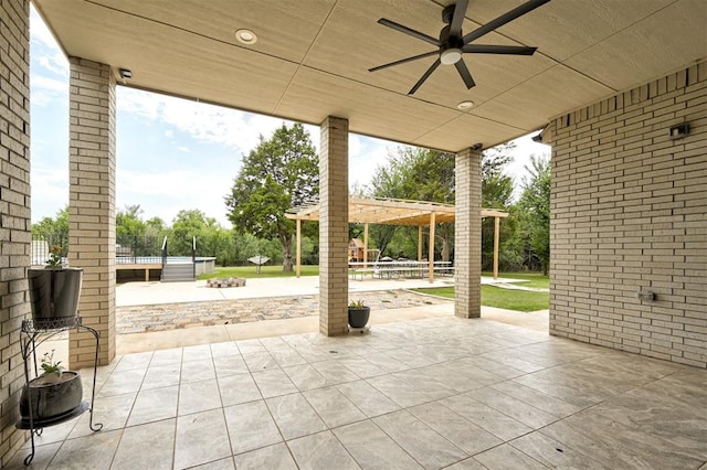 view of patio with a pergola and ceiling fan