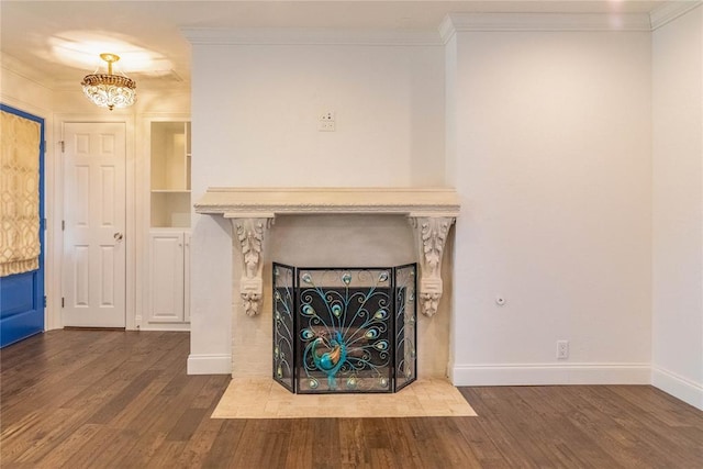 unfurnished living room with a tiled fireplace, hardwood / wood-style floors, and crown molding