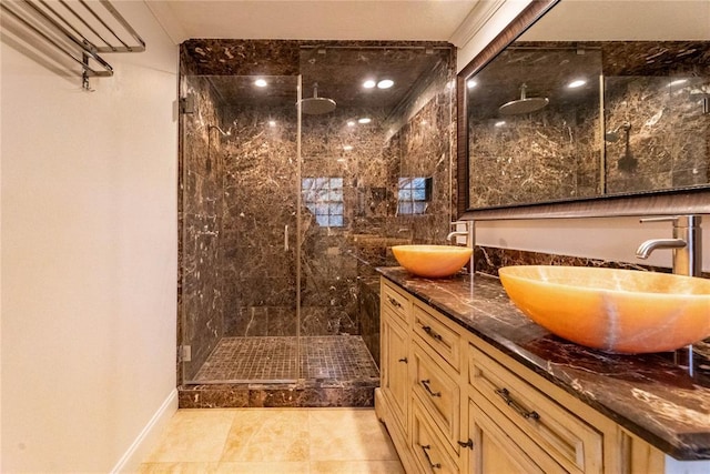 bathroom with vanity and an enclosed shower