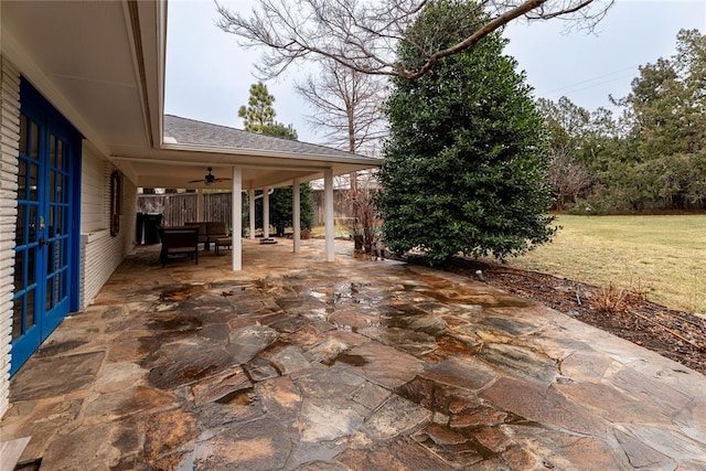 view of patio / terrace featuring french doors and ceiling fan