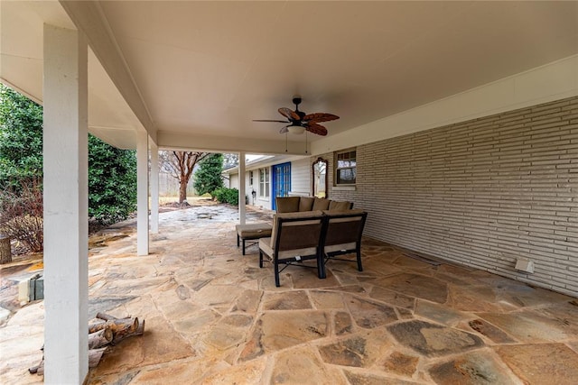 view of patio with ceiling fan