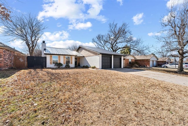 single story home with a garage