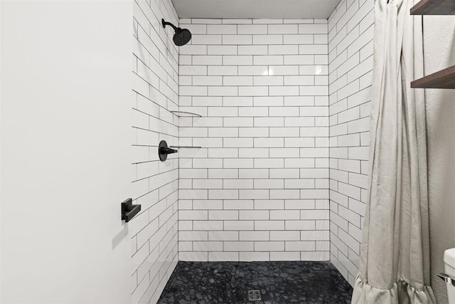 bathroom featuring walk in shower