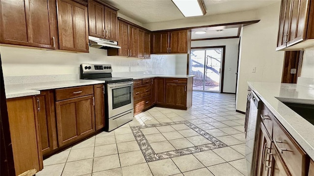 kitchen featuring light tile patterned floors, crown molding, and stainless steel appliances