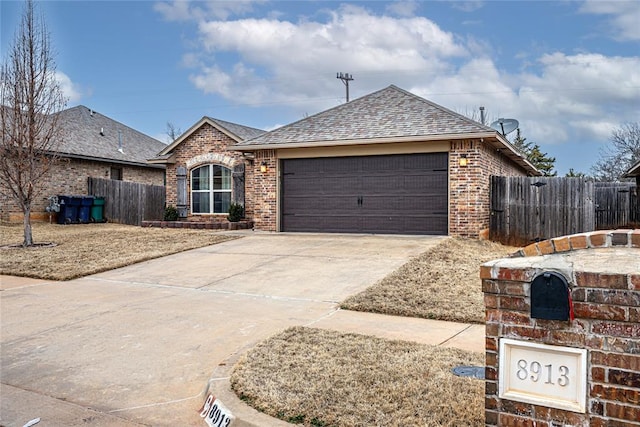 single story home featuring a garage