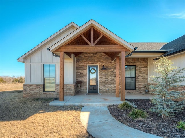 entrance to property with a porch