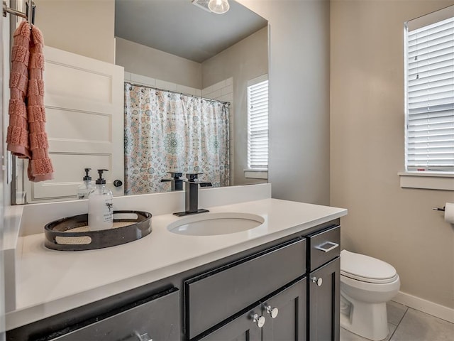 full bath featuring curtained shower, baseboards, toilet, tile patterned floors, and vanity