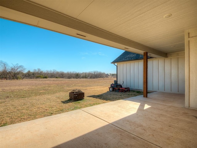 view of patio / terrace featuring a fire pit