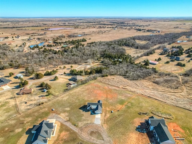 aerial view featuring a rural view and a desert view