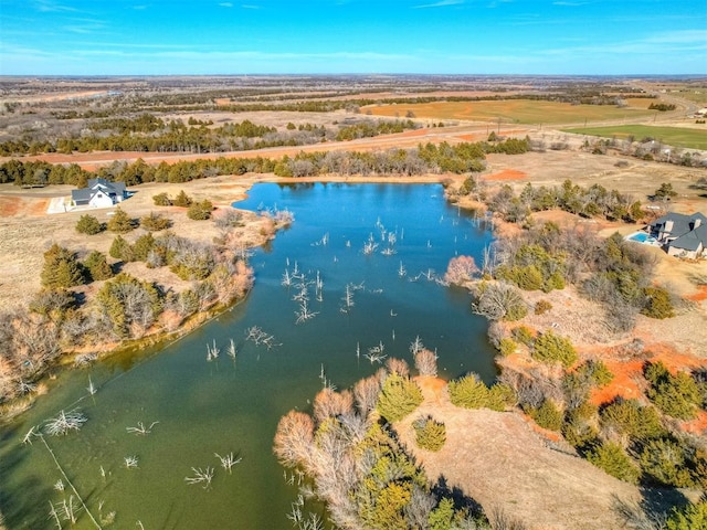 bird's eye view with a water view and a rural view