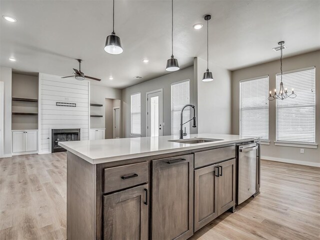 19001 Bobcat Ridge Ct, Cashion, OK 73016 - kitchen with a sink, dishwasher, a ceiling fan, light wood finished floors, and recessed lighting