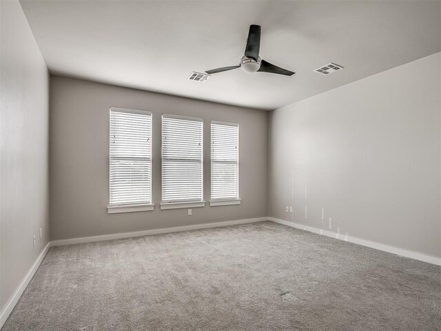 19001 Bobcat Ridge Ct, Cashion, OK 73016 - carpeted spare room with a ceiling fan and baseboards