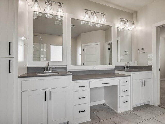 19001 Bobcat Ridge Ct, Cashion, OK 73016 - full bath featuring tile patterned flooring and double vanity