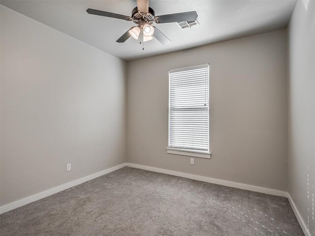 19001 Bobcat Ridge Ct, Cashion, OK 73016 - carpeted empty room with ceiling fan and baseboards