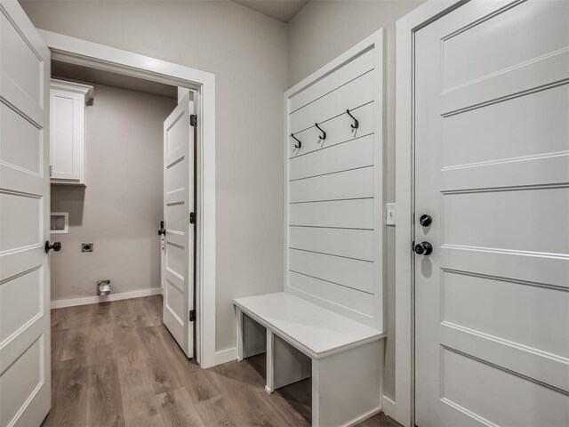 19001 Bobcat Ridge Ct, Cashion, OK 73016 - mudroom featuring wood finished floors and baseboards