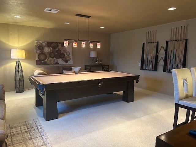 rec room featuring light carpet and billiards