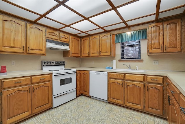 kitchen featuring sink and white appliances