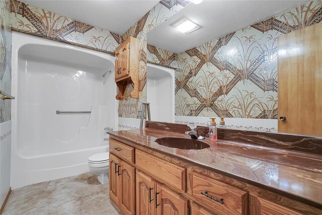 full bathroom with vanity, toilet, and tub / shower combination