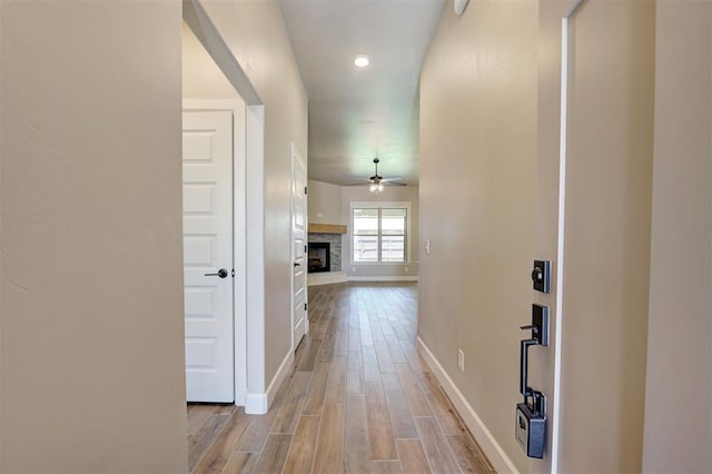 hallway with light wood-type flooring