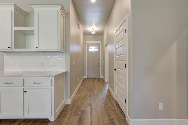 doorway featuring light wood-type flooring