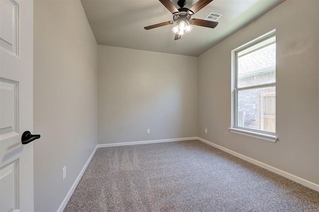 unfurnished room featuring carpet and ceiling fan