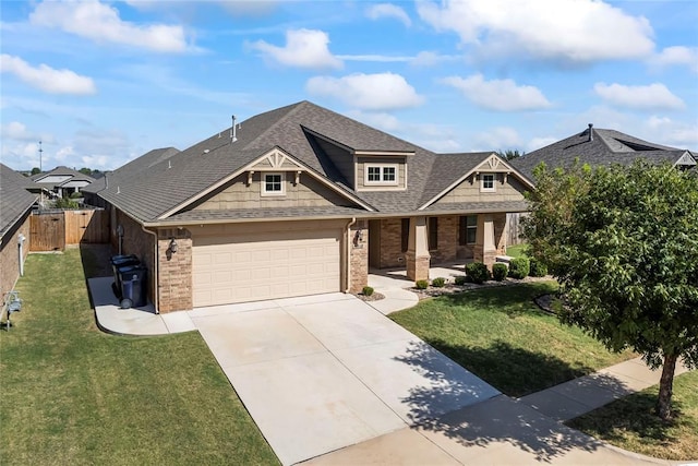 craftsman inspired home featuring a front lawn