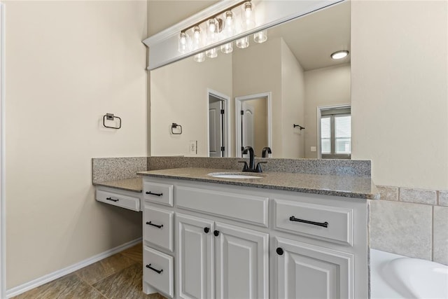 bathroom featuring vanity and a bathtub