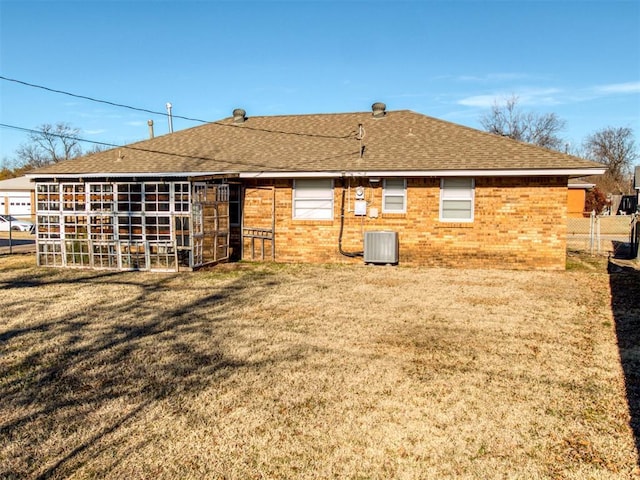 back of property featuring cooling unit