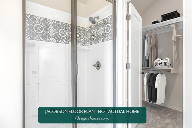 bathroom featuring lofted ceiling and an enclosed shower