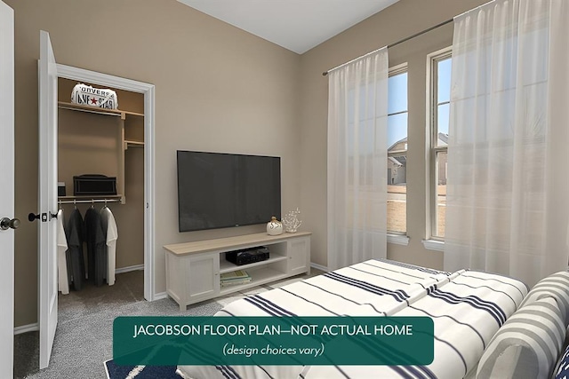 carpeted bedroom featuring a spacious closet and a closet