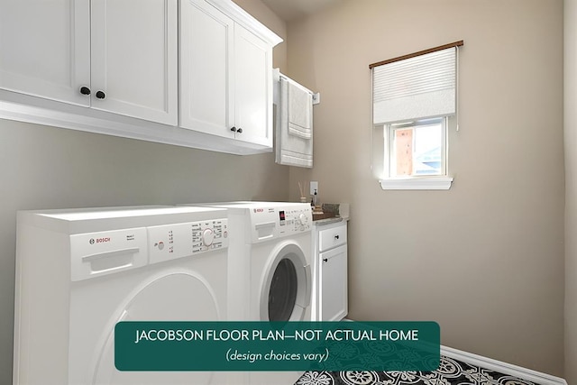 laundry room featuring independent washer and dryer and cabinets