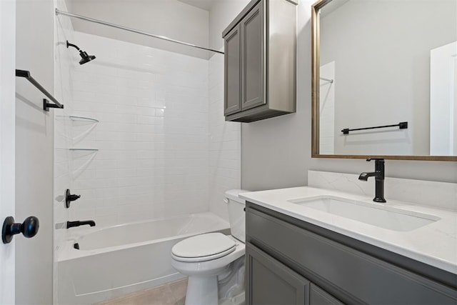 bathroom featuring shower / bath combination, vanity, and toilet