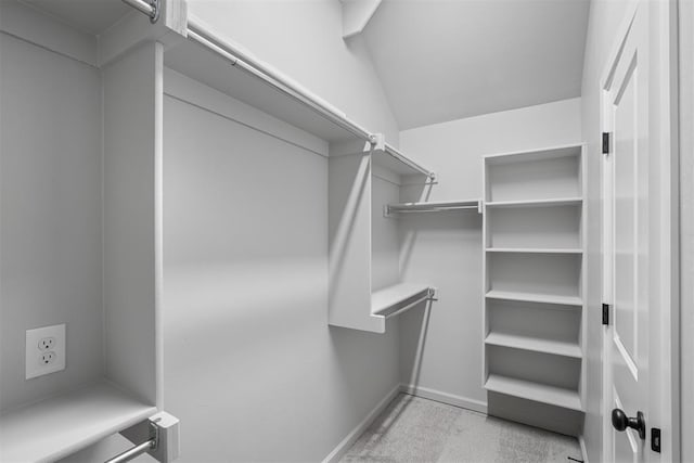 spacious closet with lofted ceiling