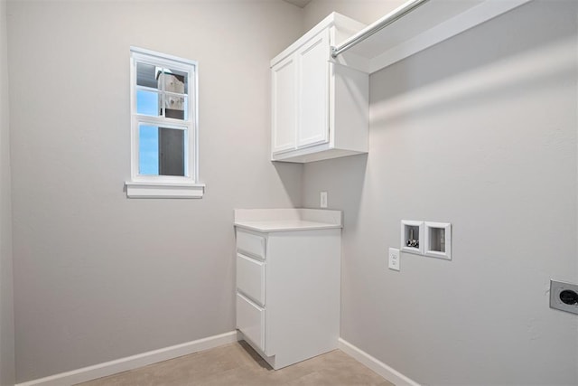 laundry room featuring cabinet space, baseboards, washer hookup, and hookup for an electric dryer