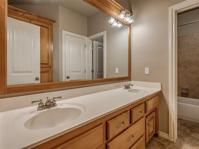 full bath featuring double vanity, shower / tub combination, and a sink