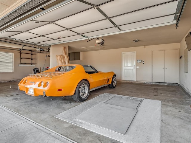 garage featuring a garage door opener