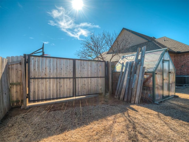 view of yard with an outbuilding and cooling unit