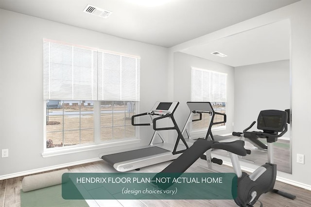 exercise area featuring hardwood / wood-style floors