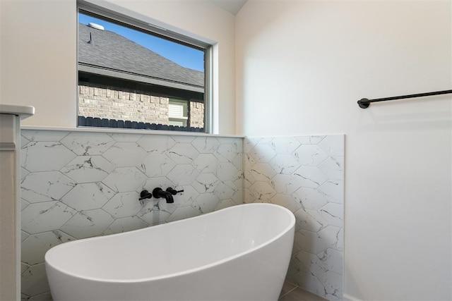 13325 SW 8th St, Yukon, OK 73099 - full bathroom featuring a freestanding tub and tile walls